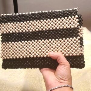 Black and white wooden beads clutch with zipper